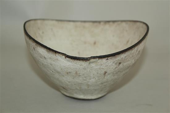 Dame Lucie Rie D.B.E. (1902-1995). A stoneware elliptical bowl, 20cm across, firing imperfection to one side